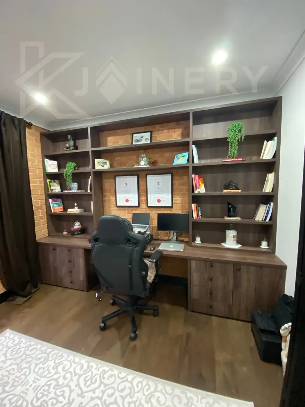 Built-in home office with a floating timber desk and drawers in a Melbourne home