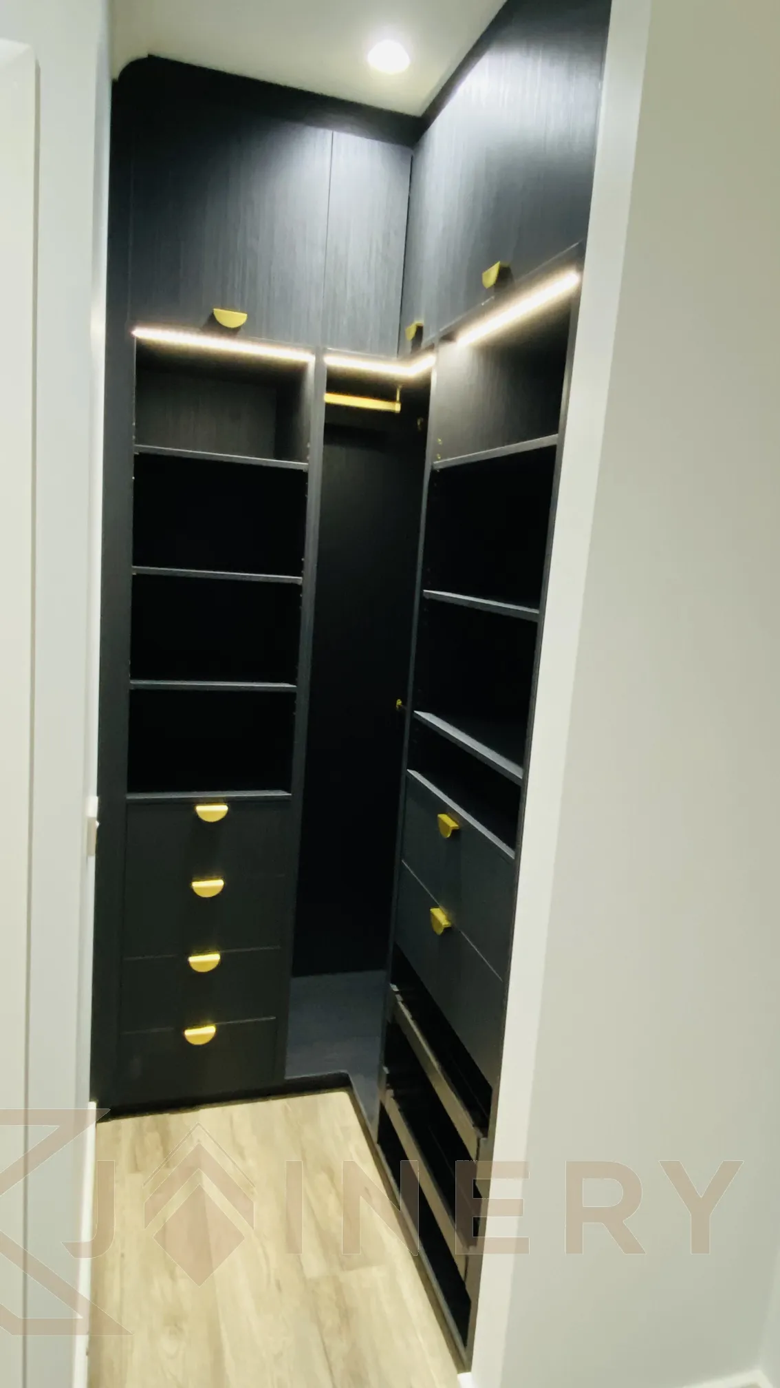 Wardrobe internal drawers and shelving detail in a custom Melbourne robe by KJoinery Australia