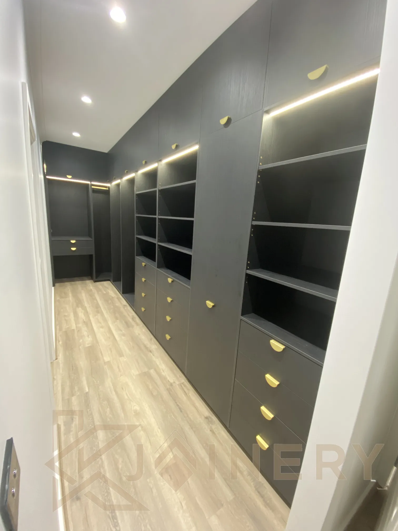 Custom walk-in robe with open shelving and hanging space in Melbourne by KJoinery Australia