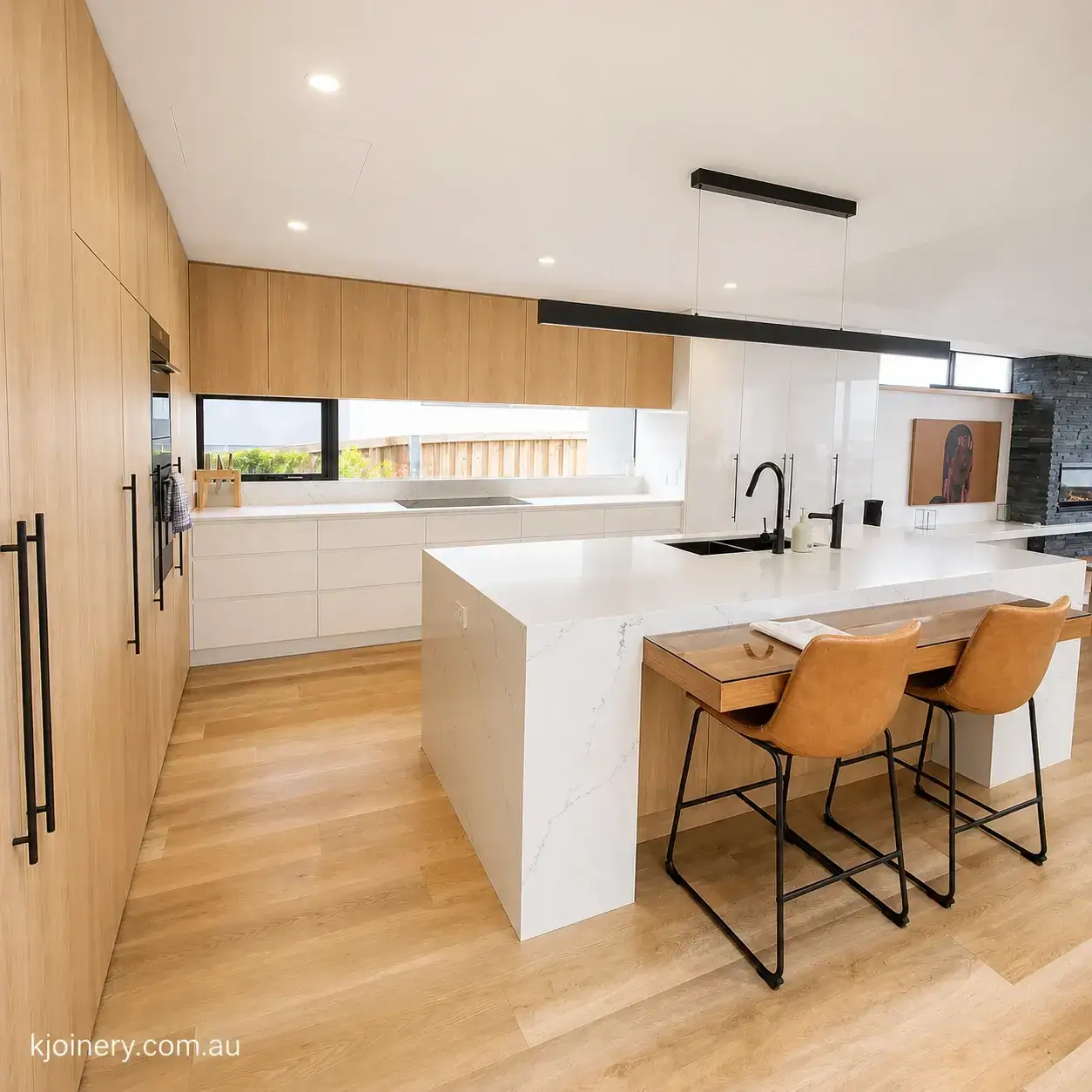 Bespoke kitchen St Kilda — open plan kitchen with island bench and timber cabinetry