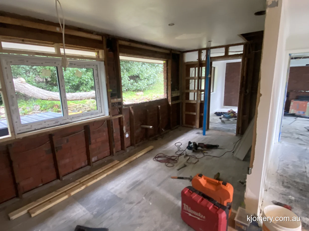 Essendon kitchen stripped back to brick and stud during the renovation