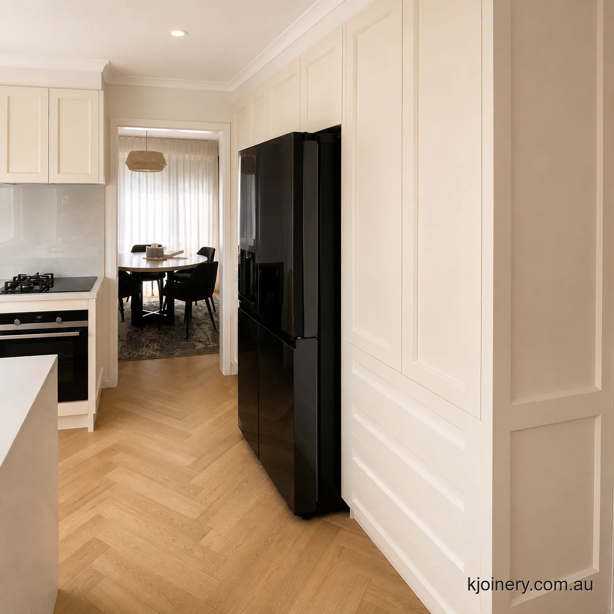 Floor to ceiling pantry storage and integrated fridge cabinetry in a Caroline Springs kitchen