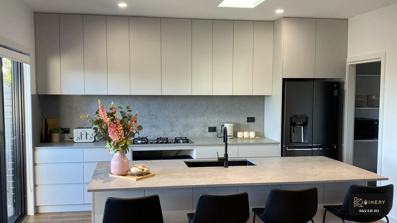 Custom kitchen joinery in Altona featuring chalk matte Laminex AbsoluteMatte cabinetry and central island
