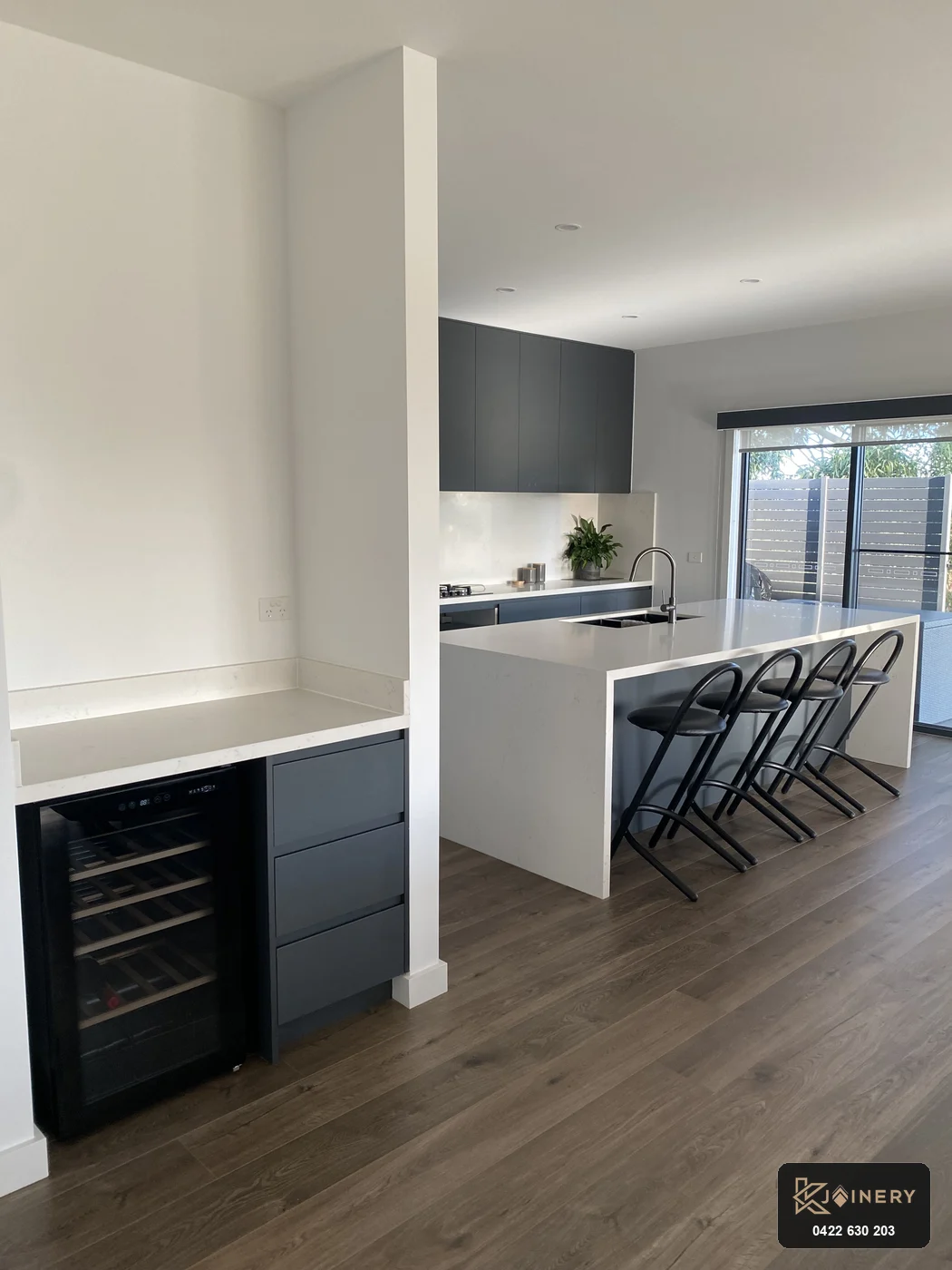 Custom dry bar and wine fridge joinery unit in Altona home with Laminex AbsoluteMatte drawers