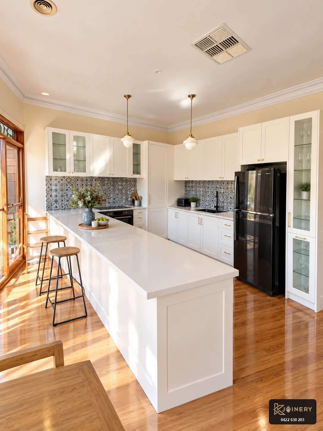 After kitchen renovation West Footscray custom shaker island and polished timber floors