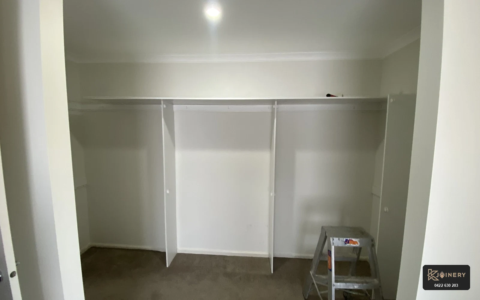 Before custom walk in wardrobe Point Cook showing raw drywall and bare floor